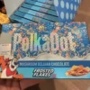 PolkaDot Magic Mushroom Belgian Chocolate Bar Frosted Flakes. This product is a delightful fusion of rich chocolate and the natural goodness of mushrooms. Indulge in the unique taste and texture of this delectable treat that will leave your taste buds craving for more.